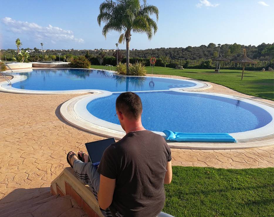 Permanent traveler Denis at the pool